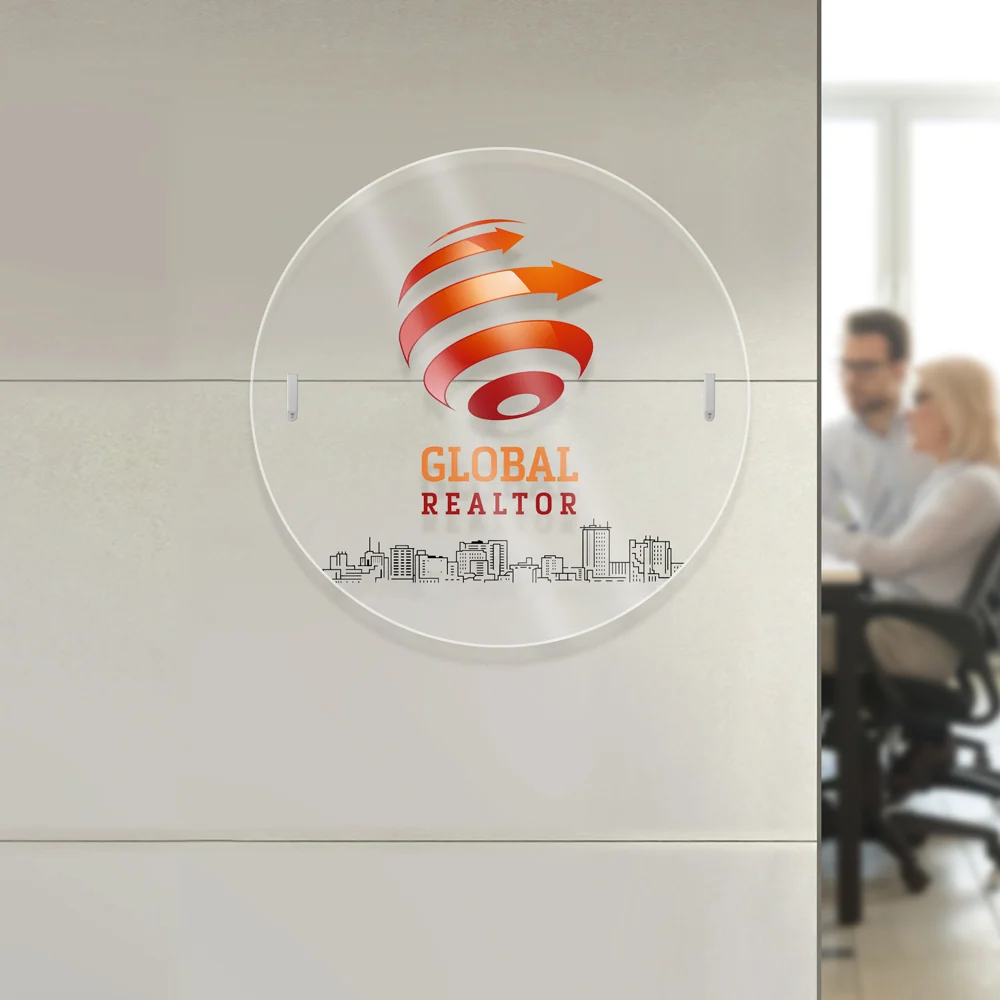 Letrero acrílico con un logo instalado en una oficina; referencia de producto.